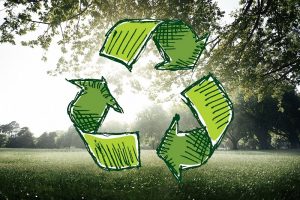 Zdjęcie przedstawia symbol recyklingu.